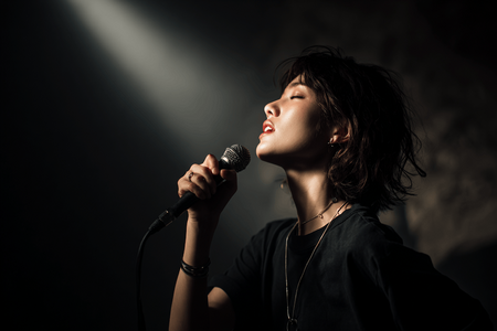 u2933761673_A_realistic_Japanese_female_vocalist_performing_o_367ab85b-3b46-4088-9b29-3a79bda26857_3.png
